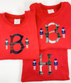Nutcrackers and Monogrammed Plaid Initial on Boy's Red Christmas Shirt